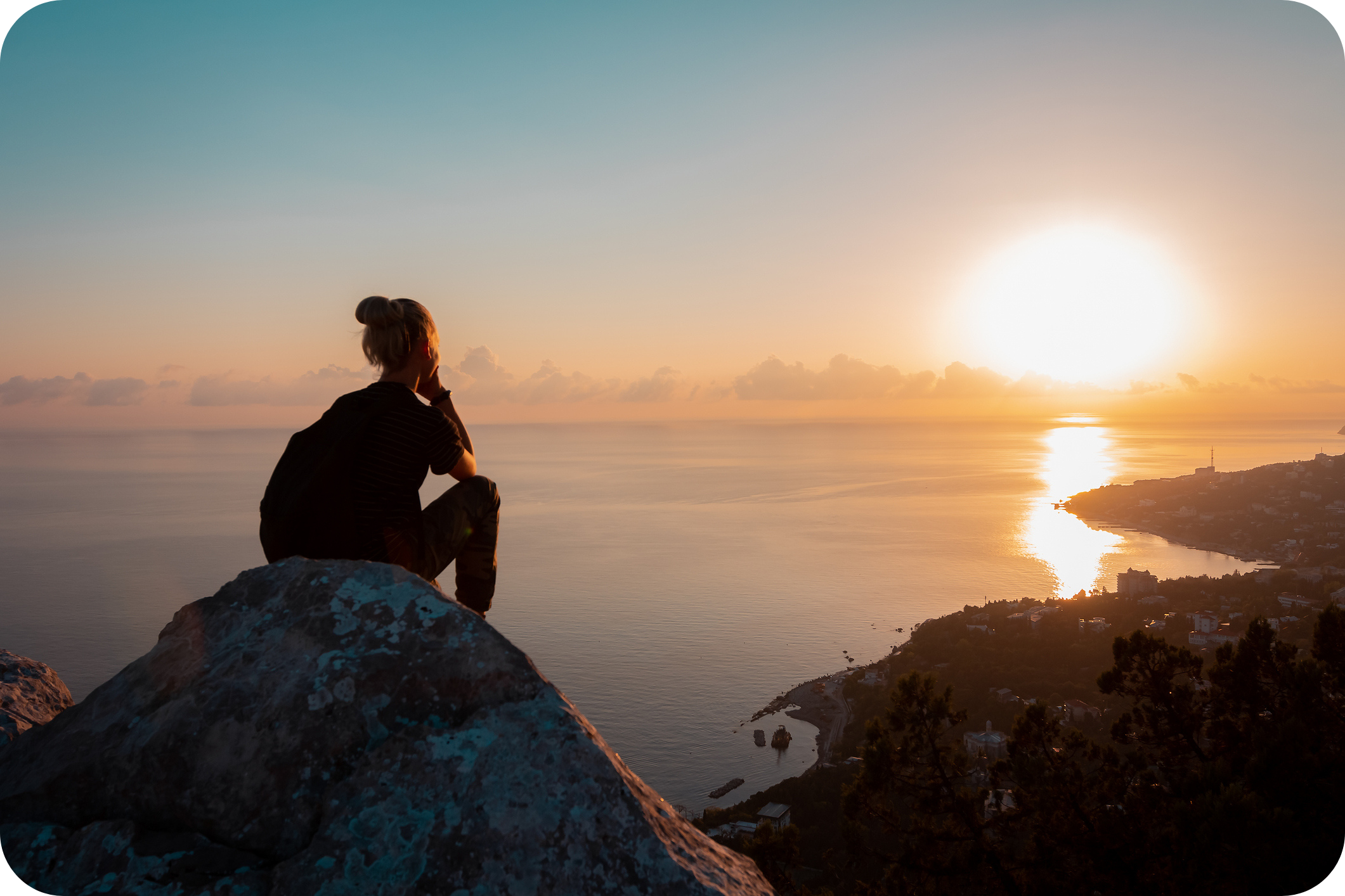 Woman looking at a sunset