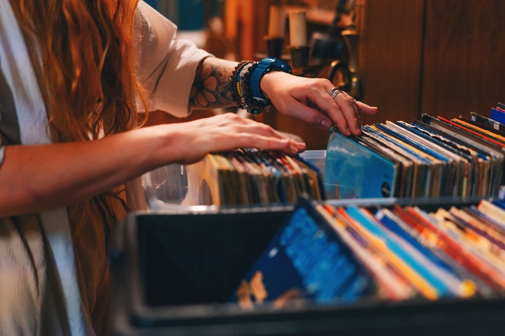 woman's hand looking for vinyls