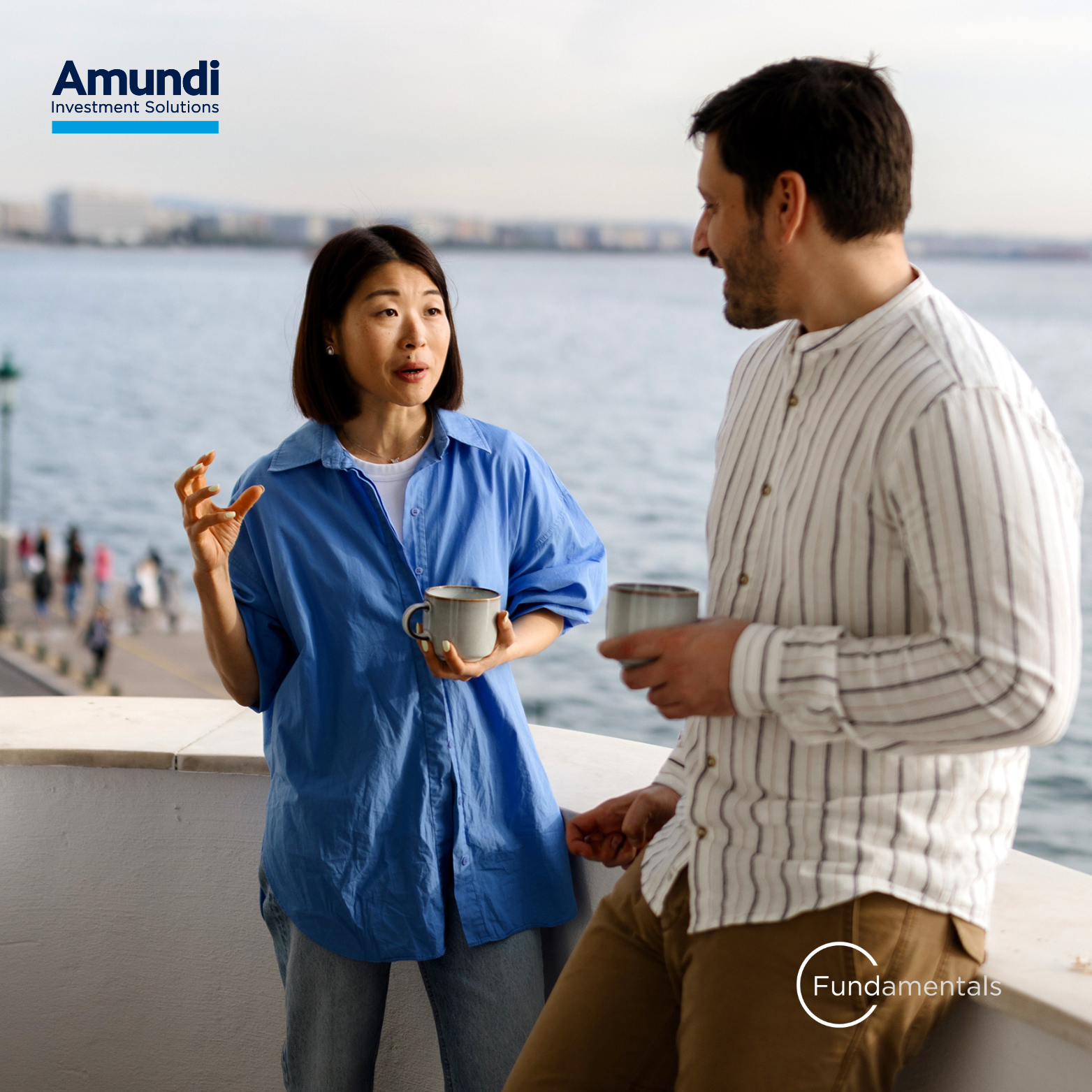 Two people chatting over coffee